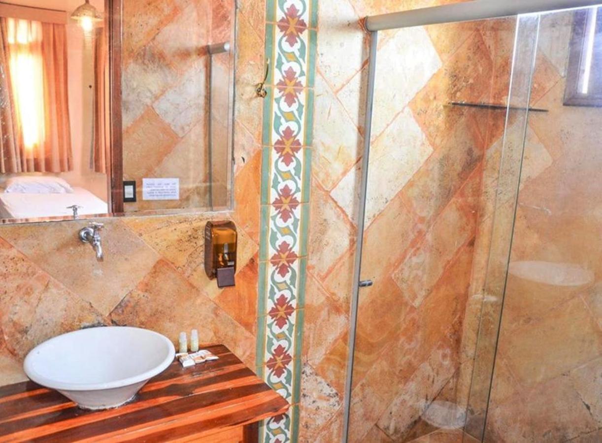 Quarto Triplo com Varanda e Vista Mar